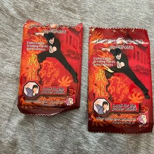 2 unopened packages of Jackie Chan adventures ranging cards.